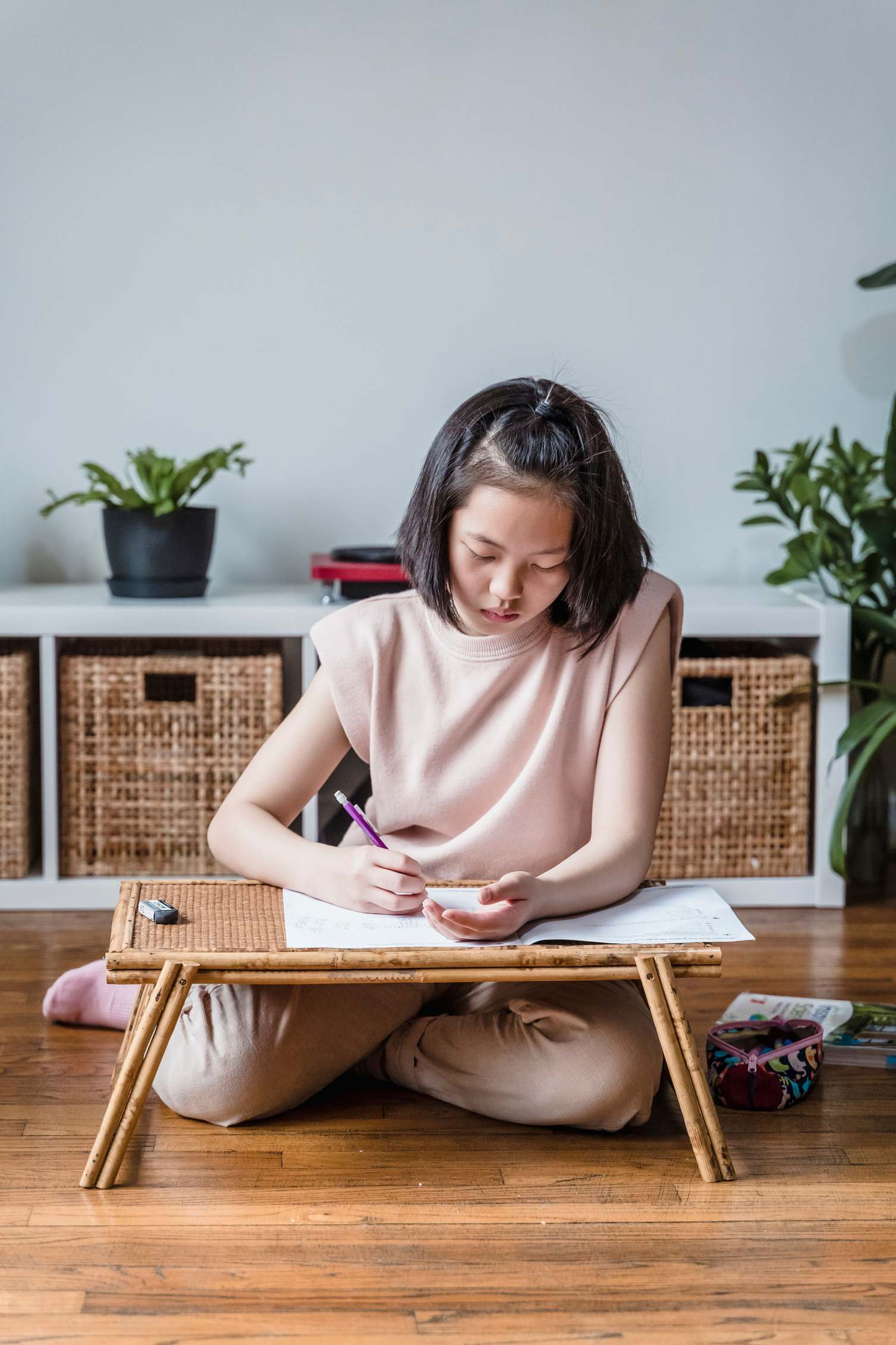 Person studying at a table with notes